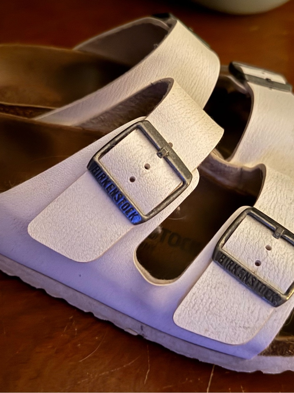 Birkenstock White Arizona Two-Strap Sandals with Silver Buckles